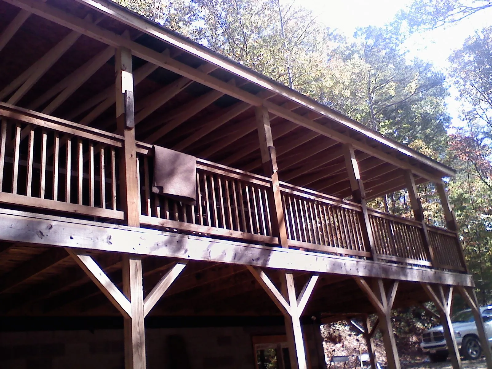 Timber framing under a new elevated porch and deck — Roof Leak Repair in Bartlesville by Roofing Brothers